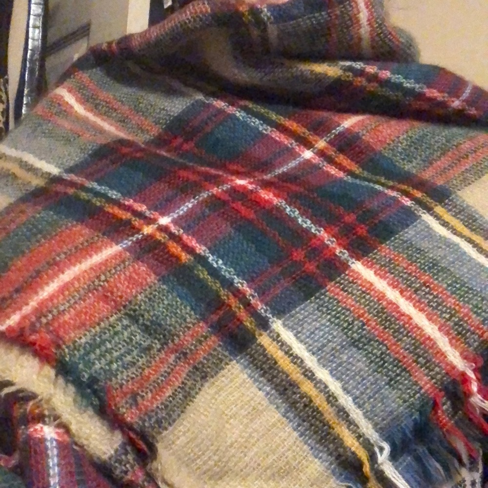 Blanket type throw. Light and warming.